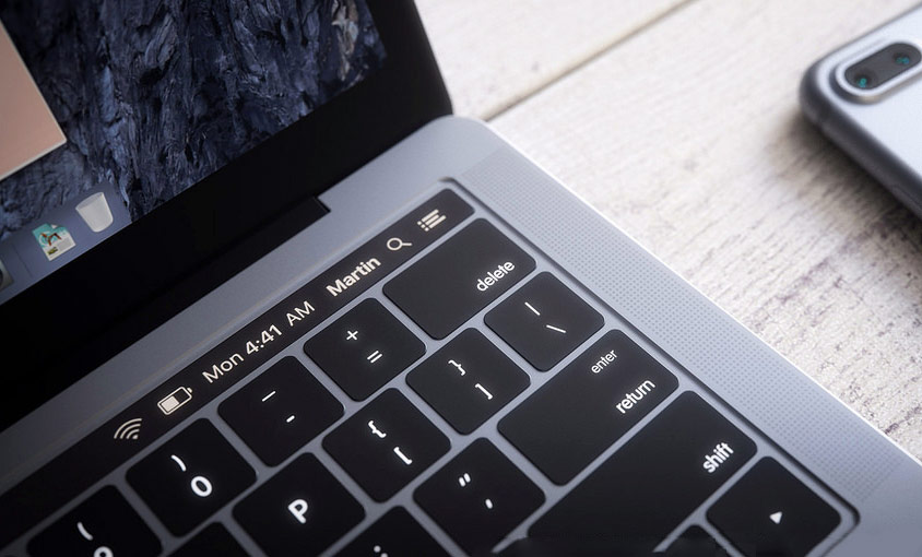 In the code macOS Sierra found references to the OLED panel and the scanner Touch ID in the new MacBook Pro In the code macOS Sierra found references to the OLED panel and the scanner Touch ID in the new MacBook Pro